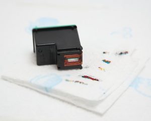 Gunakan Lap Basah pada cartridge